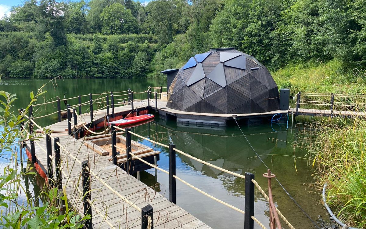 Lilypod floating timber cabin on a lake near Dartmoor